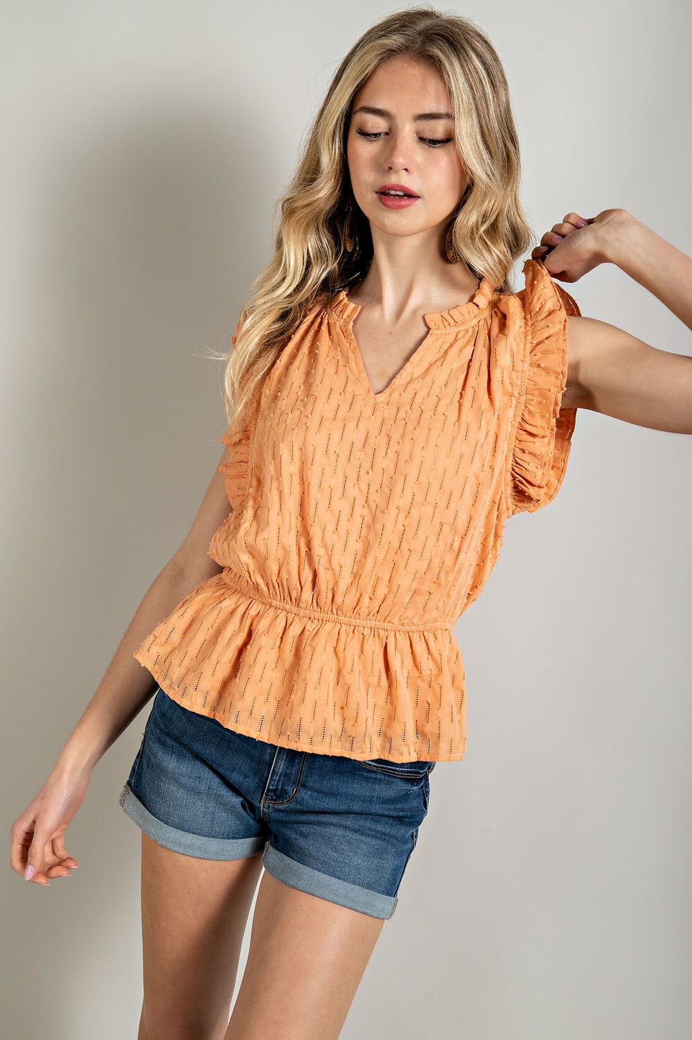 RANDA RUFFLE PEPLUM TOP